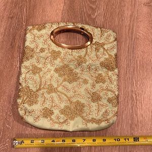 Light green and gold special occasion clutch bag